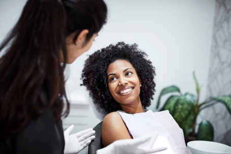 woman smiling in dental chair