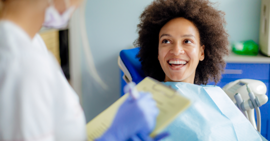 dentist with happy patient