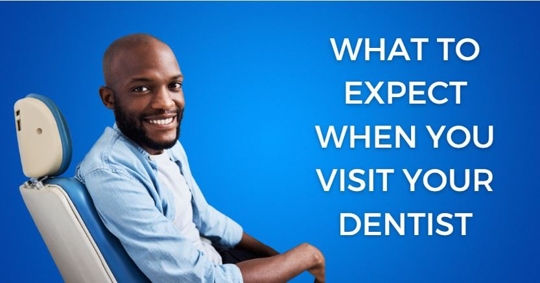 man smiling in dentist chair