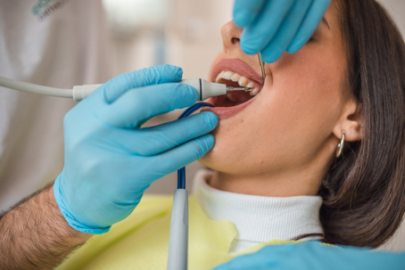 Woman getting her teeth cleaned